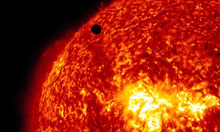 eyes turn skyward as venus travels across the sun
