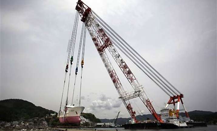 ships tossed ashore by japan tsunami get rescued