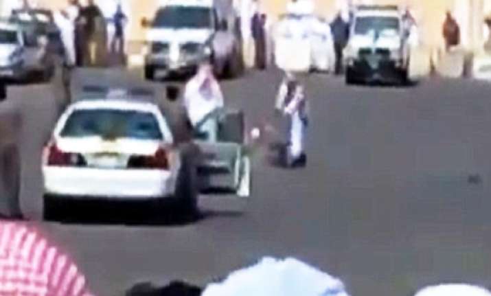 shocking footage of sudanese man publicly beheaded in saudi