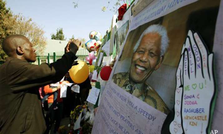 south africa mandela remains critical as family feuds