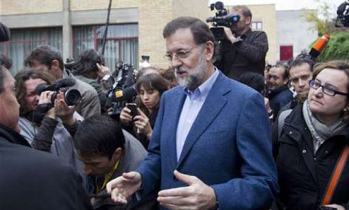 spanish conservatives win general elections