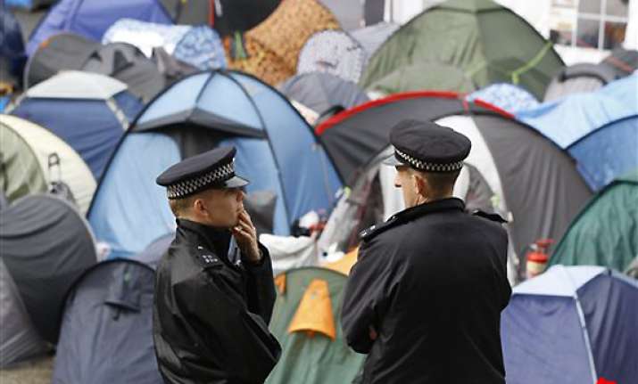 st paul s to reopen but protest standoff goes on