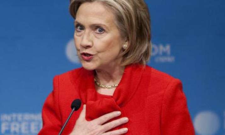 stop this unacceptable bloodshed in libya clinton