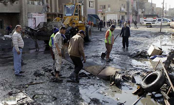 suicide car bomb outside baghdad hospital kills 31 people