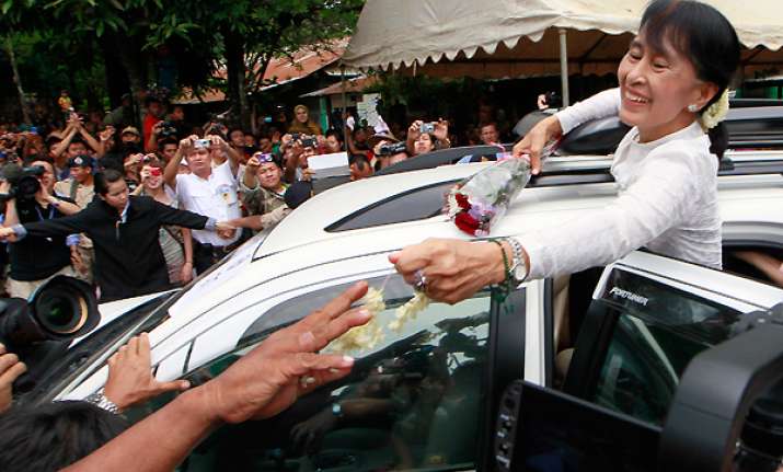 suu kyi returns home after 1st trip in 24 years