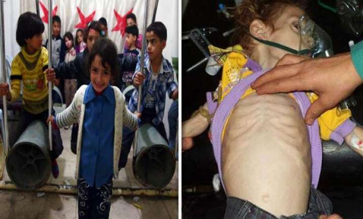 syria unrest children are forced to play with rockets and