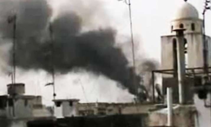syrian troops shell homs eight killed