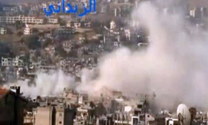 syrian forces battle rebels near damascus