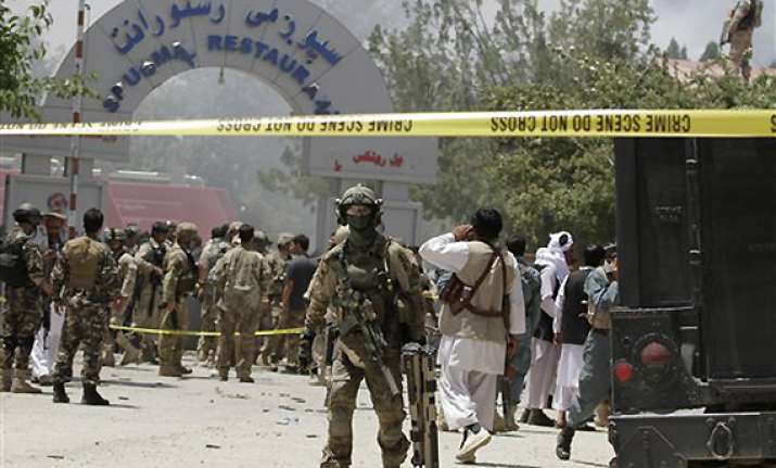 taliban storm afghan hotel killing 18 people
