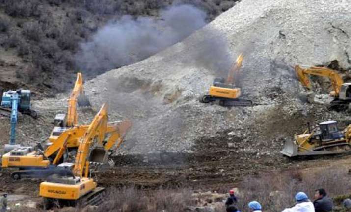three buried in china landslide