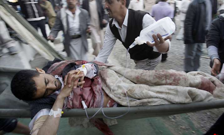 troops hit protesters marching into yemen capital