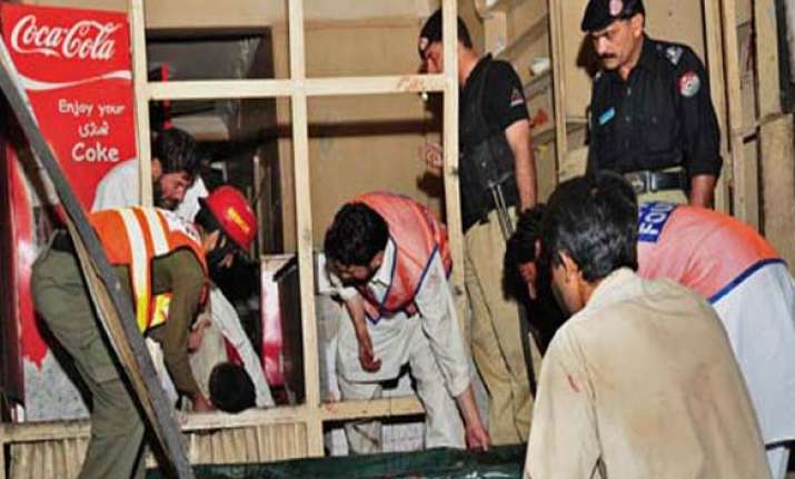 twin blasts kill 34 in pakistan