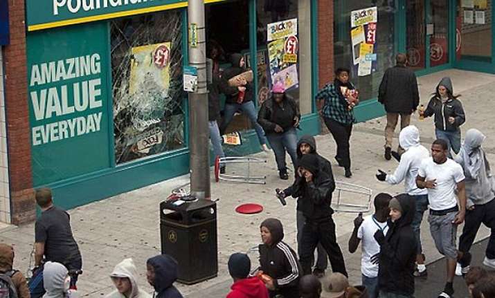 uk courts sit overnight to try riot accused