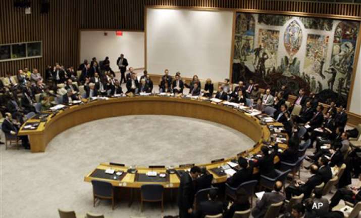 unsc unanimously slaps sanctions on libya