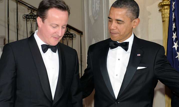 us britain committed to 2014 transition plan on afghanistan