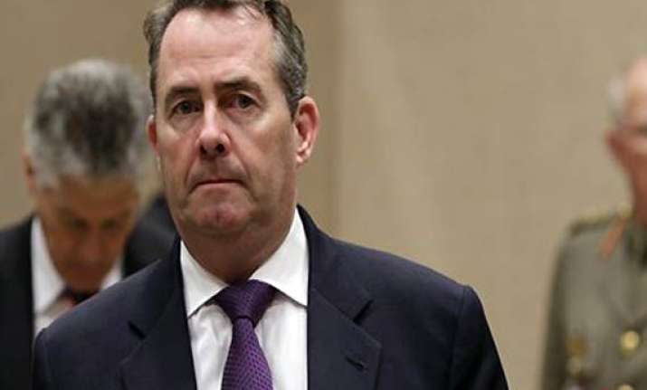 under fire uk defence secretary quits