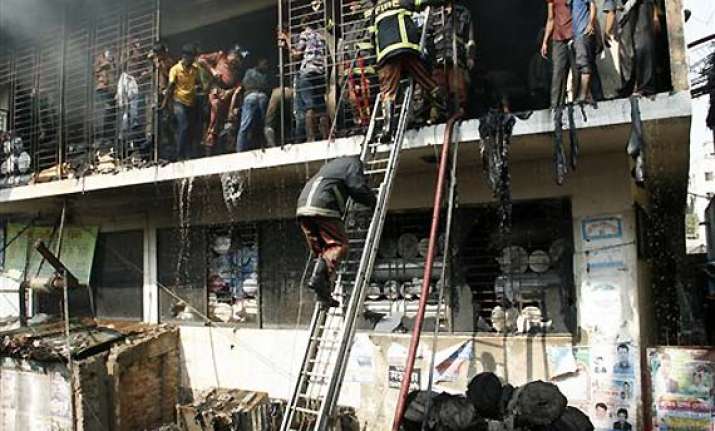 wal mart distances itself from garment factory fire in