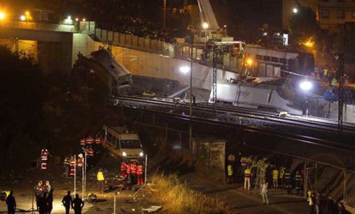 watch spain derailment rescue operations in pics