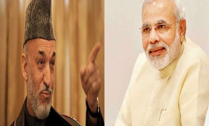 will protect indian missions karzai tells modi