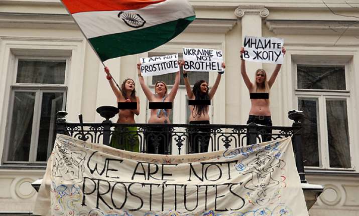 topless ukrainians may face jail for insulting indian flag