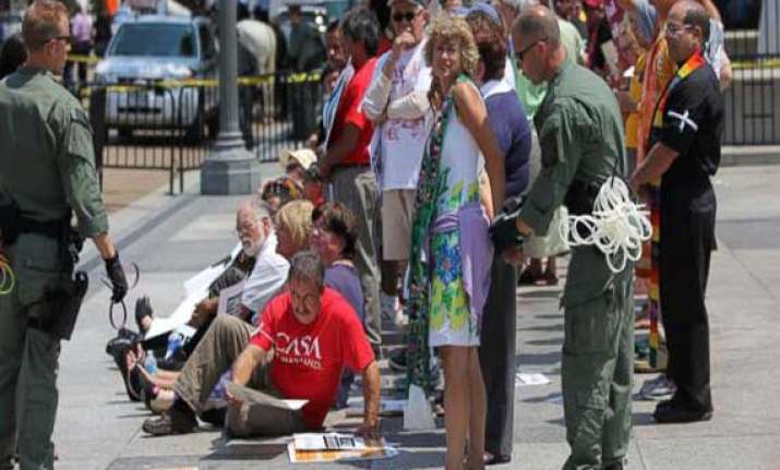 100 immigration activists arrested in front of white house