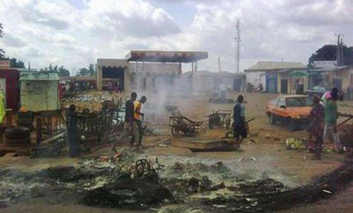 118 killed in nigerian twin blasts