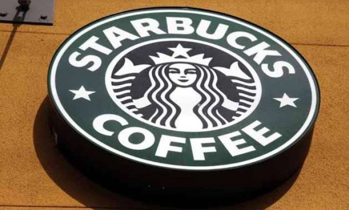 in symbolic move starbucks to open first shop in italy