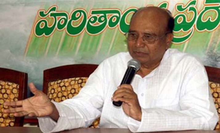 ap minister punches his pa on his nose