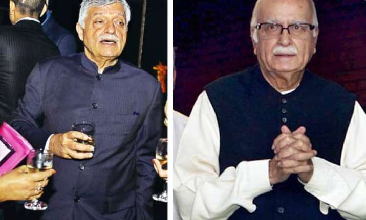 advani demands probe into satish sharma s role in cash for