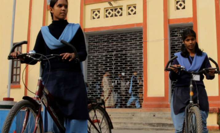 after free bicycles jd u announces free sanitary napkins