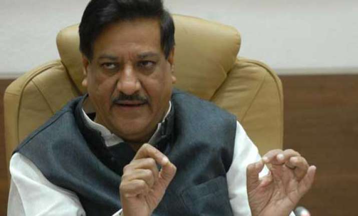 ahead of elections maharashtra govt legalises slum transfer