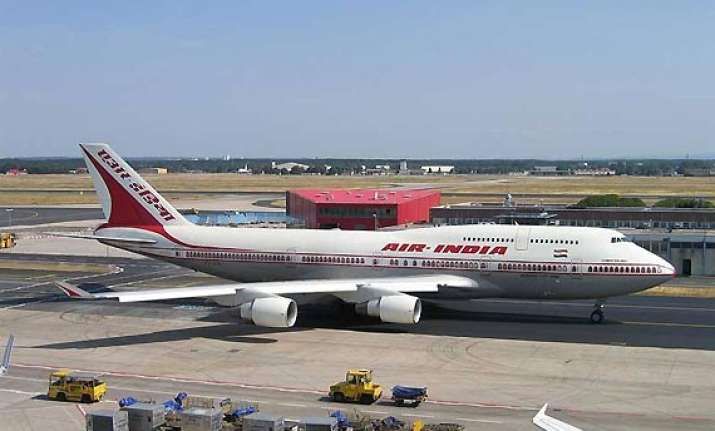air india cabin crew member detained in london for