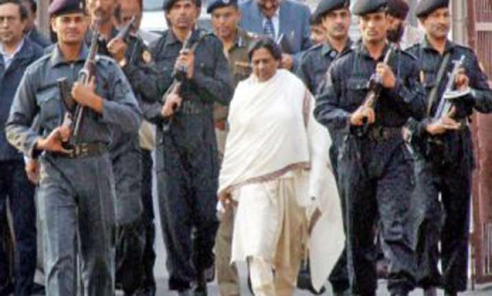 akhilesh reduces mayawati s security cover
