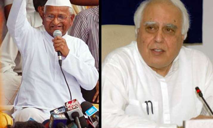 anna hazare demands sibal s resignation