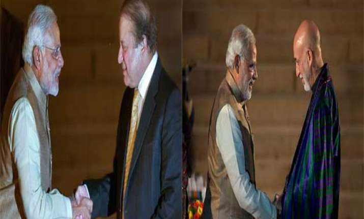 as pm modi has brief exchanges with saarc leaders
