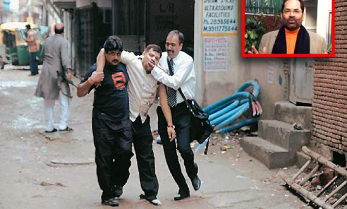 bjp asks pm to break silence on batla encounter