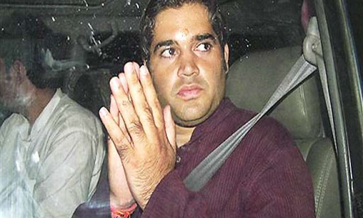 bjp workers hurl shoes at varun gandhi s cavalcade