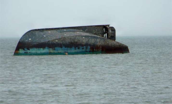 boat capsizes two persons missing