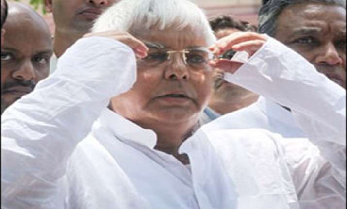 cbi court frames charges against lalu 3 others in fodder