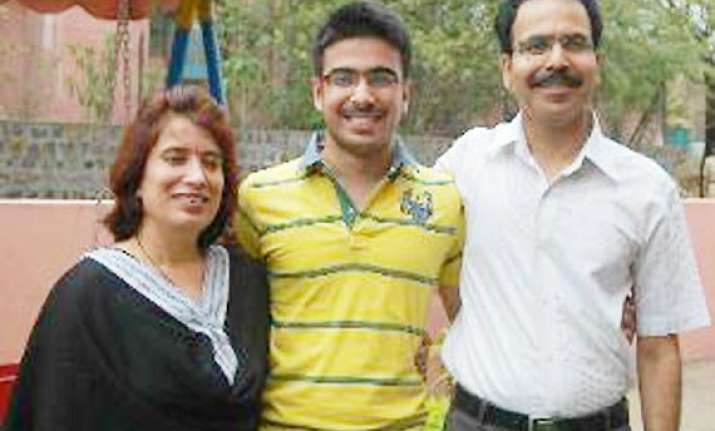 cbse results son tops xiith exam as father takes on naxals