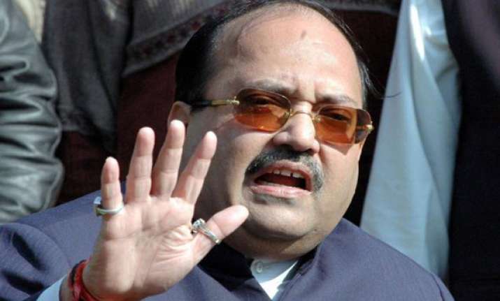 cash for vote scam hc defers amar singh s bail plea