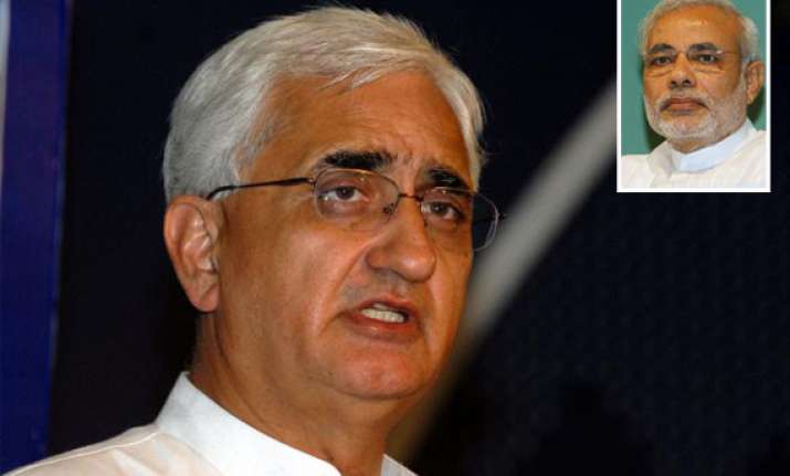 centre defends gujarat governor