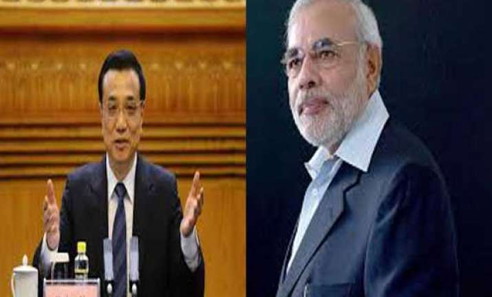 will deal with outstanding issues modi tells chinese pm