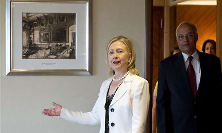 hillary clinton urges india to expand influence