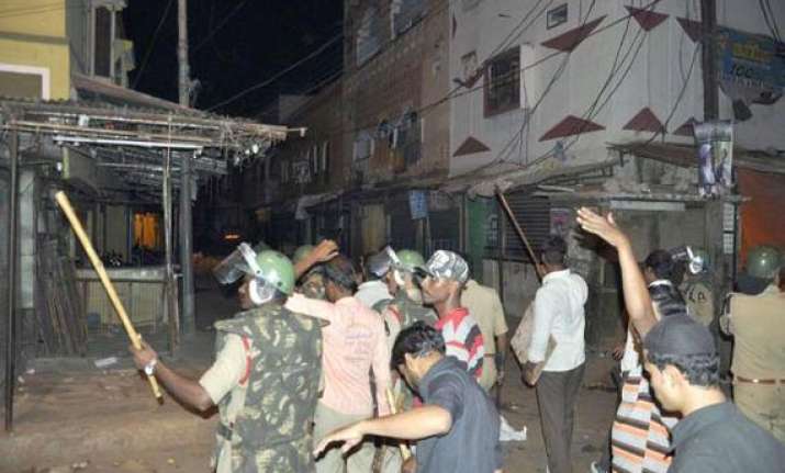 communal clash in ap town four injured