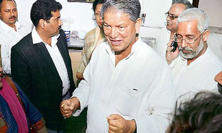 cong seeks to mollify rawat no change in leadership issue