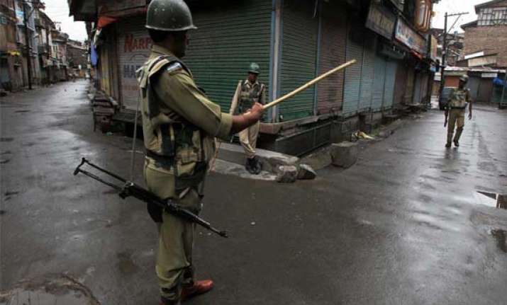 curfew in j k town after injured woman dies