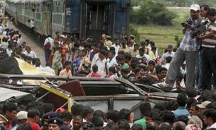 death toll in medak bus train collision climbs to 18