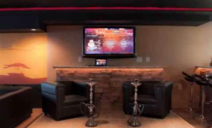 delhi govt opposes running of hookah bars by city restaurant
