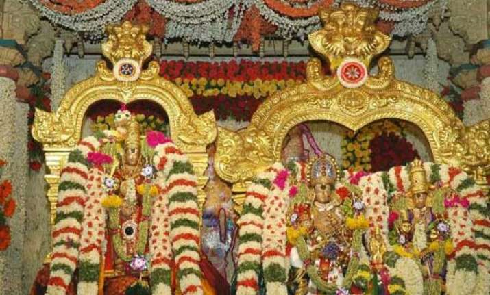 devotees throng meenakshi temple for celestial wedding